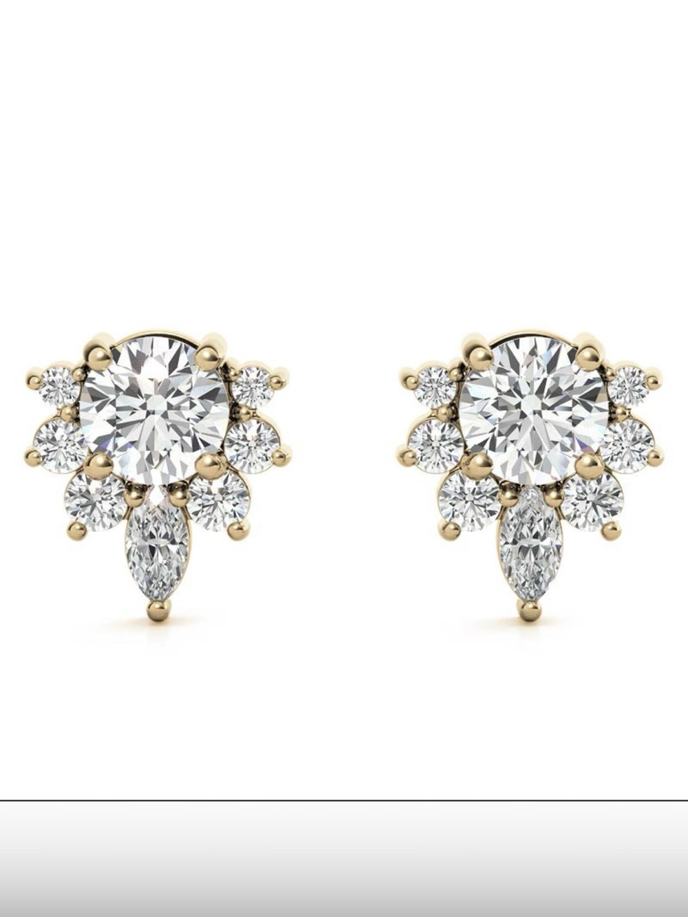 14k gold cluster stud earring marquise round cubic zirconia in a floral design.